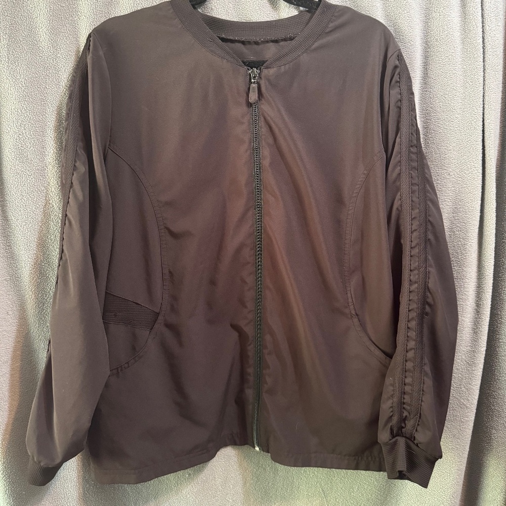 White cross stretch black scrub jacket